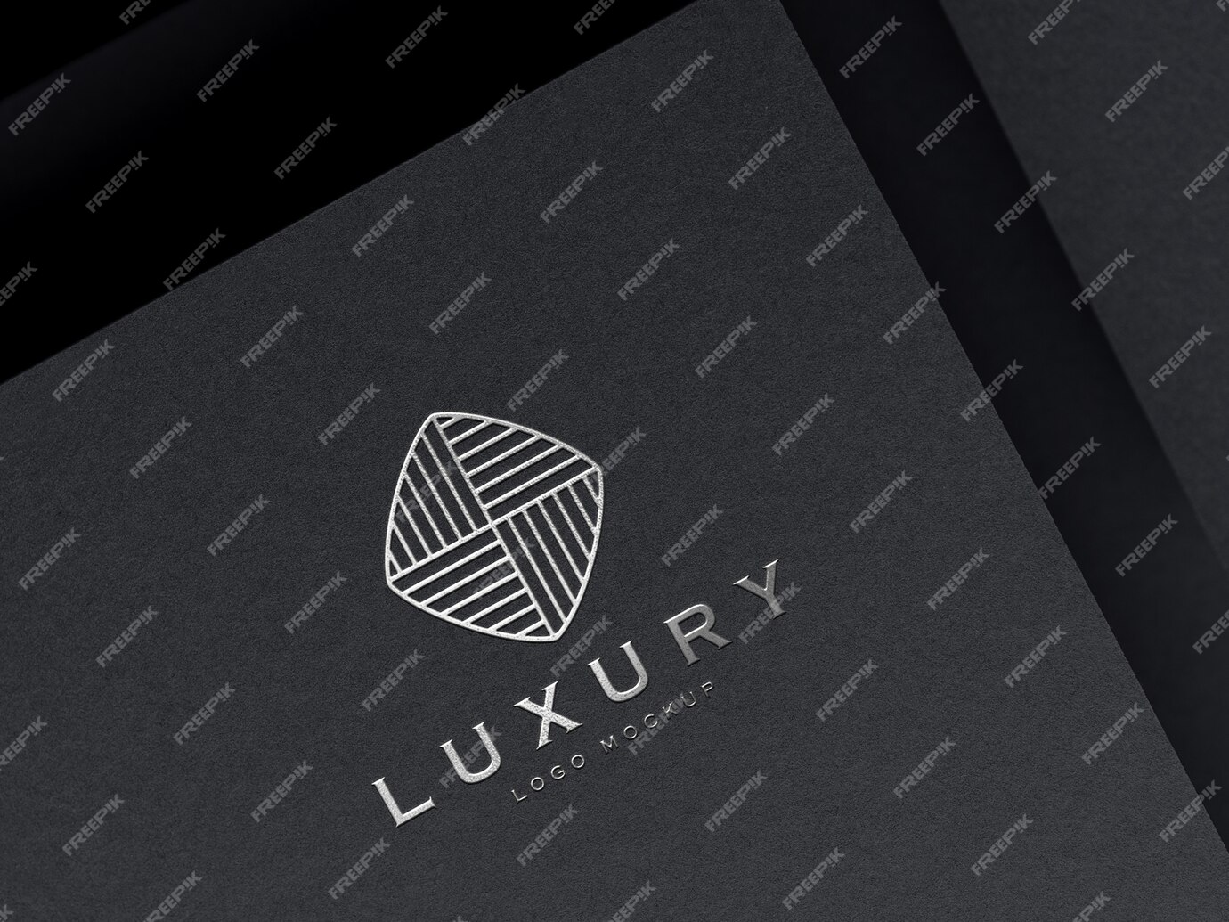 Premium PSD | Realistic silver embossed luxury logo mockup