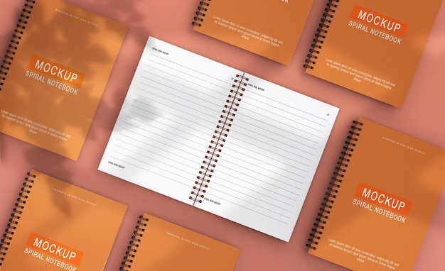 PSD realistic spriral notebook mockup design with leaf shadow