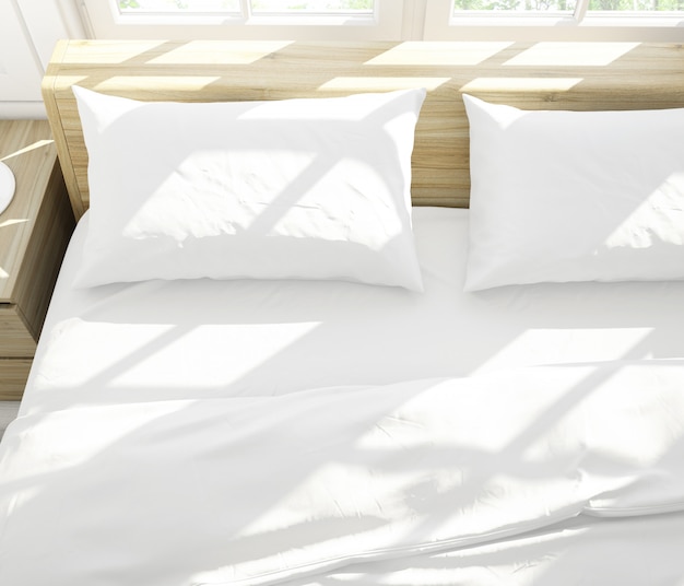 realistic white pillows on a double bed