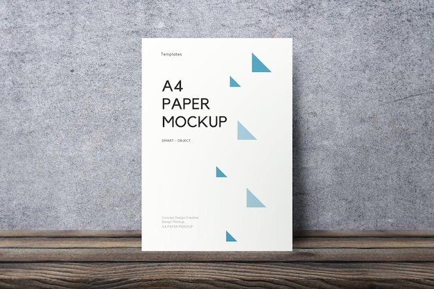 Realistisch A4-papiermodel op oppervlaktehout