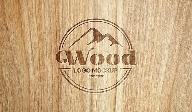 PSD realistisch logo mockup op hout gegraveerd close-up op houtstructuur mockup