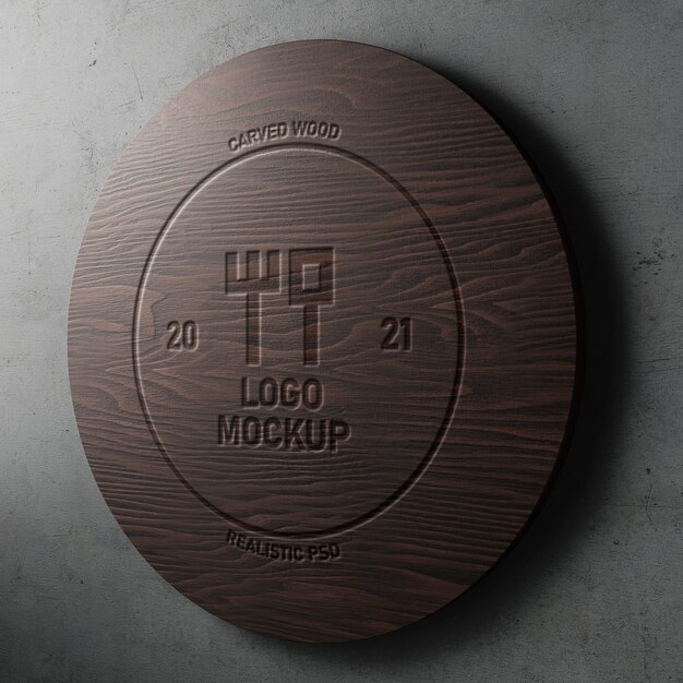 Realistyczna makieta logo z grawerowanym efektem na nowoczesnym okrągłym drewnie na betonowej ścianie