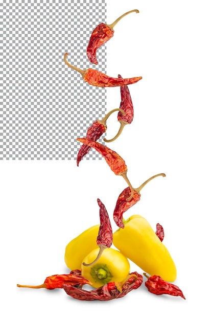 Red dried chili pepper drops on yellow bell pepper isolated on transparent background