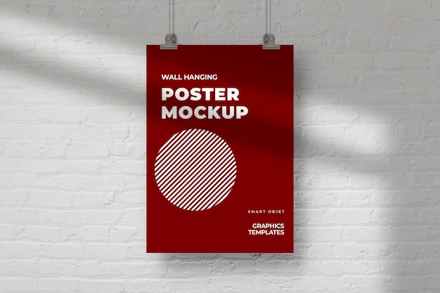 Mockup poster appeso rosso su sfondo bianco muro di mattoni