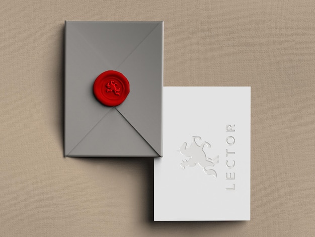 赤いシールが貼られた灰色の封筒の上部に赤いシールが貼られています。