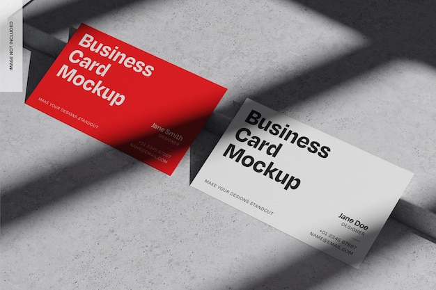 a red and white business card with the words business card written on it