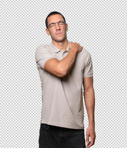 Relaxed young man making a gesture of sleep