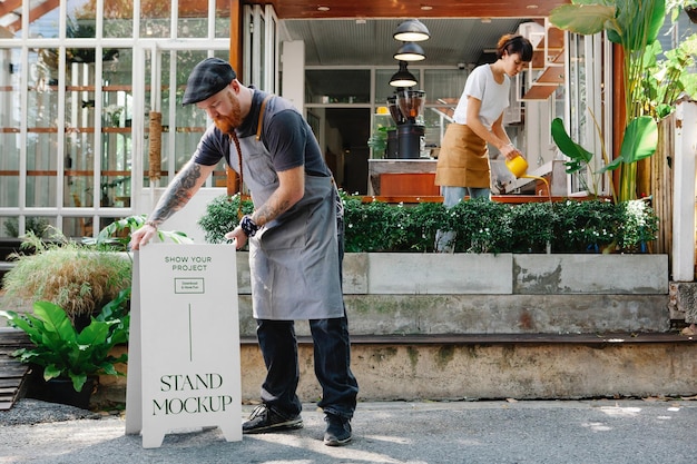 PSD restaurant stand with people mockup