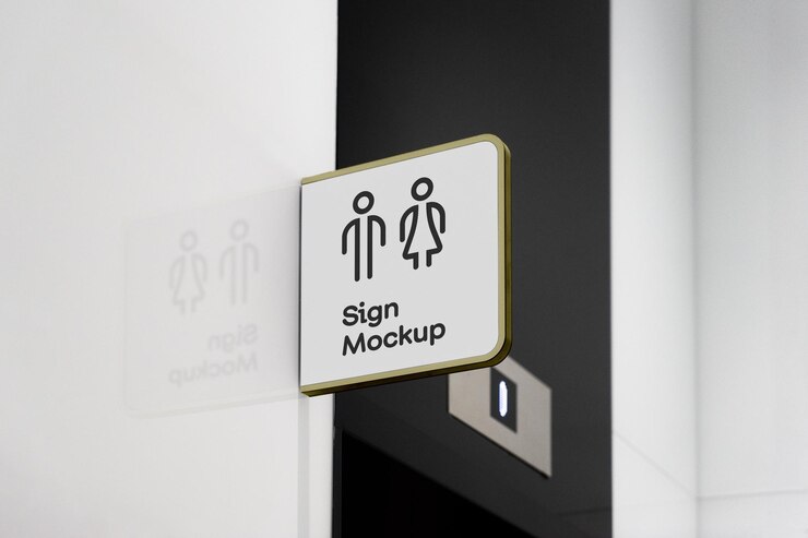 PSD restroom sign mockup on a white wall
