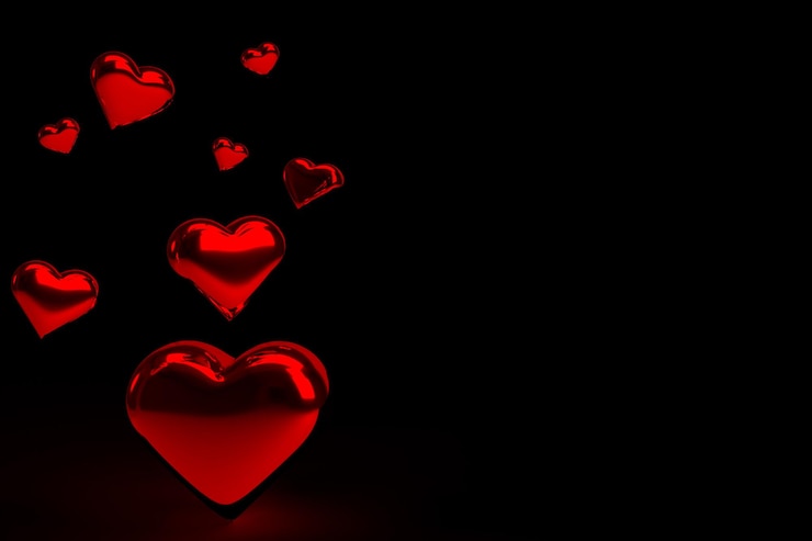 PSD rode harten op een zwarte achtergrond die liefde en romantiek vertegenwoordigen.