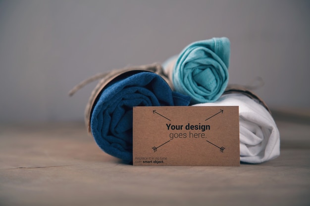 Rolled t-shirts with business card mockup