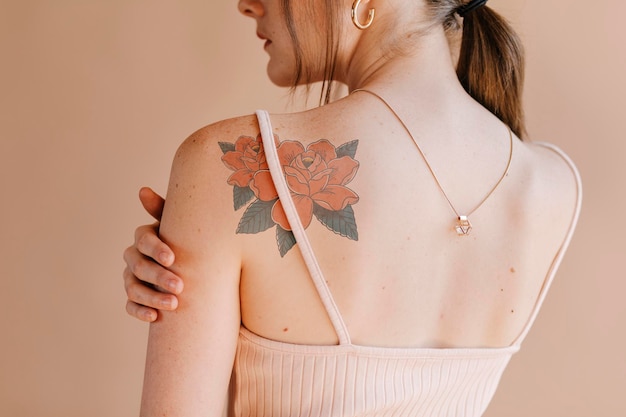Rose tattoo design mockup psd on a woman&amp;rsquo;s shoulder