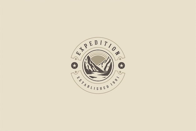 round logo for mountains expedition company