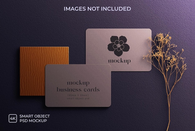 PSD rounded business cards on wooden ply on rough texture background