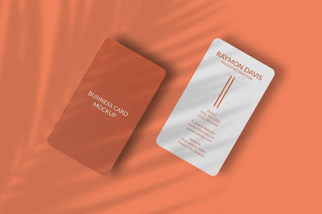 Rounded corner vertical business card mockup with leaf shadow