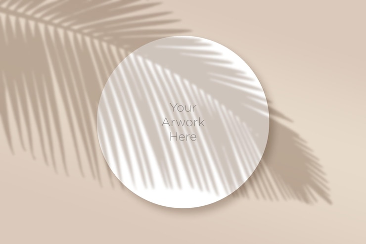 PSD rounded paper mockup flat lay with leaves shadow
