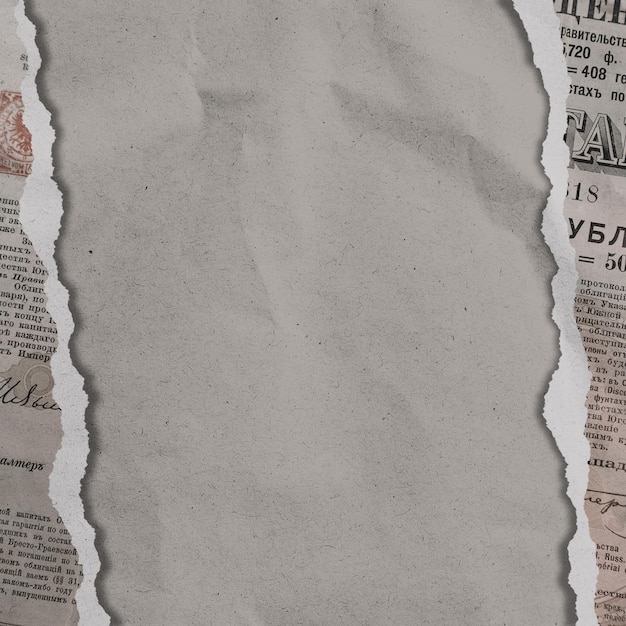 Rozdarta stara gazeta na brązowym tle