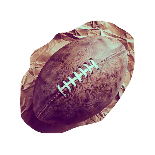 Rugby ball on crumpled paper cut out image