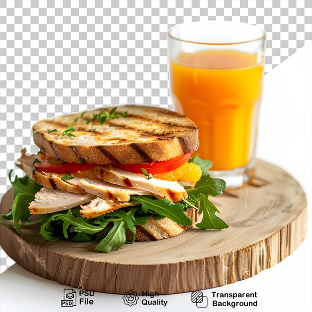 PSD sandwich with a glass of orange juice on a wooden board isolated on transparent background