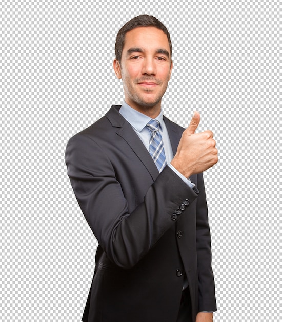 Satisfied young businessman doing an approval gesture