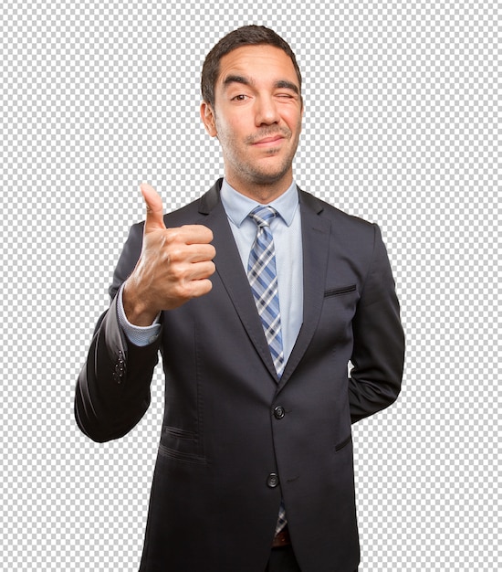 PSD satisfied young businessman doing an approval gesture