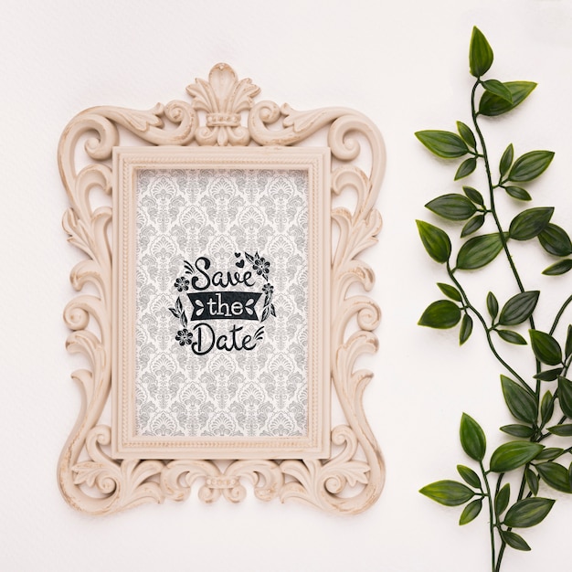 Save the date mock-up baroque frame with leaves