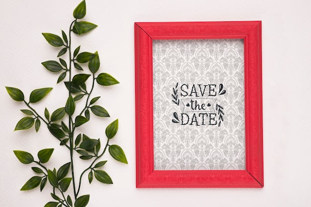 PSD save the date mock-up red frame and plant