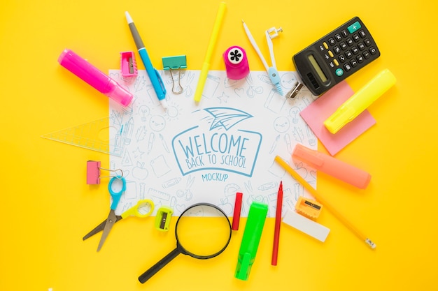 School supplies on yellow background