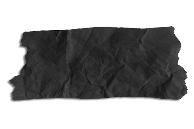 Scrap of crumpled black paper on empty background