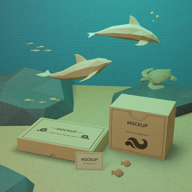 PSD sea life and cardboard boxes underwater with mock-up