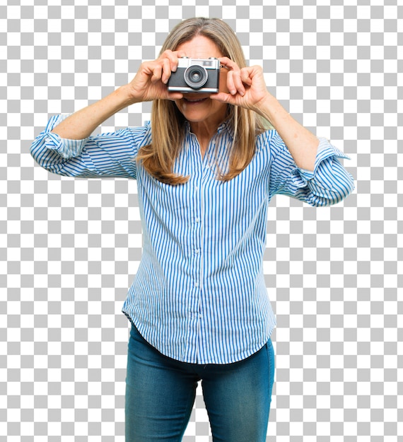 Senior beautiful woman with a vintage camera