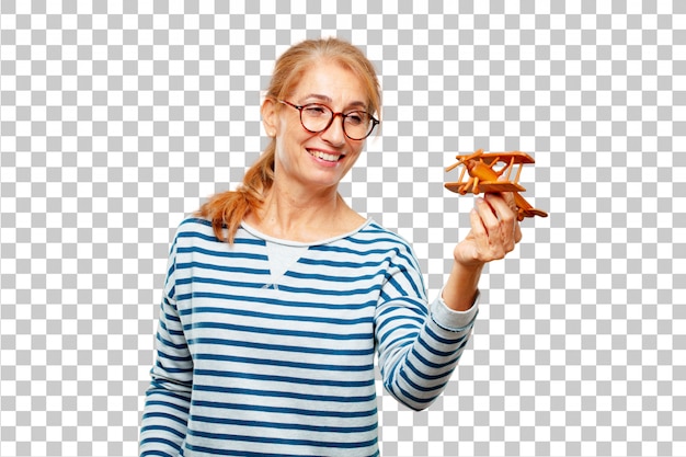 Senior beautiful woman with a wooden plane