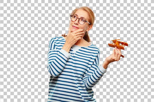 Senior beautiful woman with a wooden plane