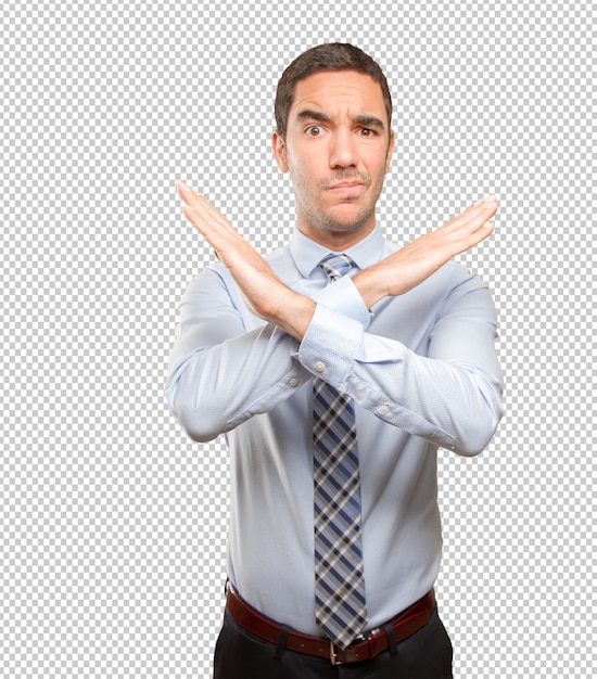 PSD serious young businessman doing a prohibition gesture