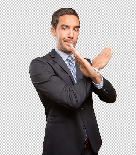 PSD serious young businessman doing a prohibition gesture