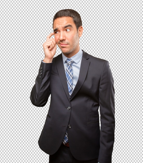 Serious young businessman wondering