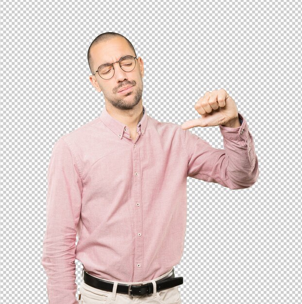 PSD serious young man doing a gesture of defeated