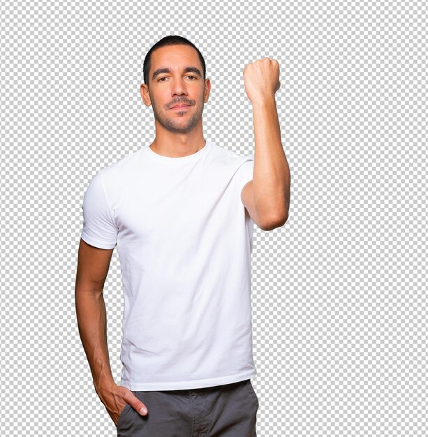 Premium PSD | Serious young man with his fist up