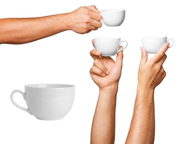 set White mug in mans hand on empty background