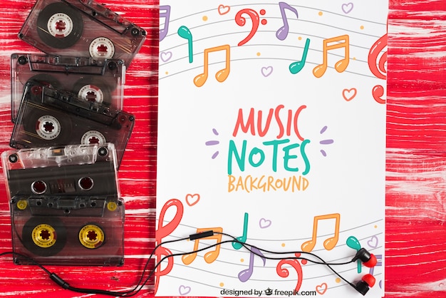 PSD sheet with musical notes design and tapes beside