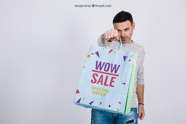 Shopping bag mockup with stylish man