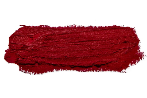 Short lipstick smear with matte surface on empty background
