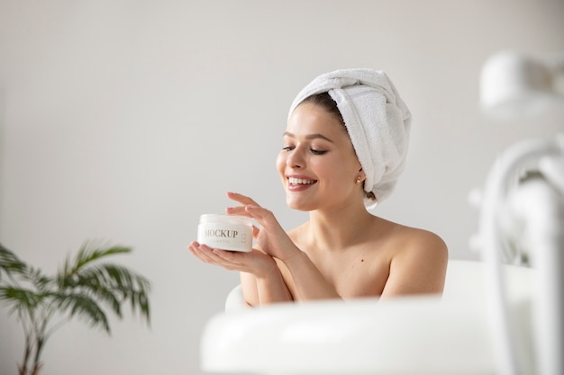 side view woman taking care of herself