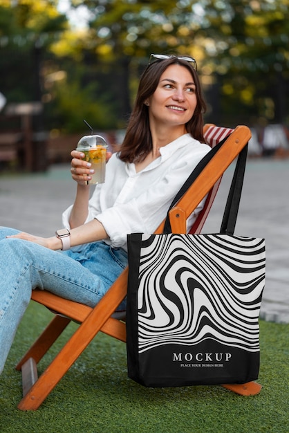 PSD side view woman with optical print tote bag