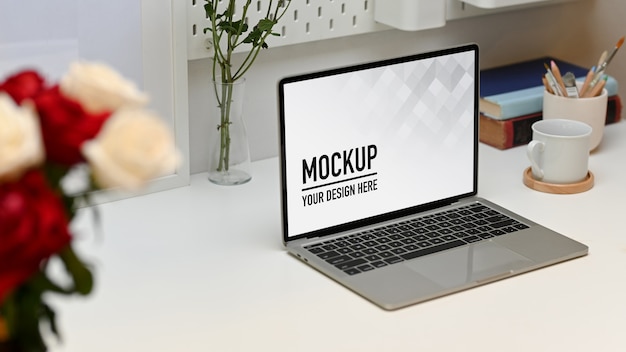 PSD side view of worktable with laptop mockup