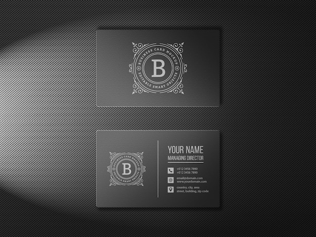 PSD sided business card mockup on carbon texture