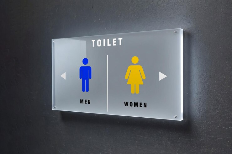 PSD a sign that says toilet men and women