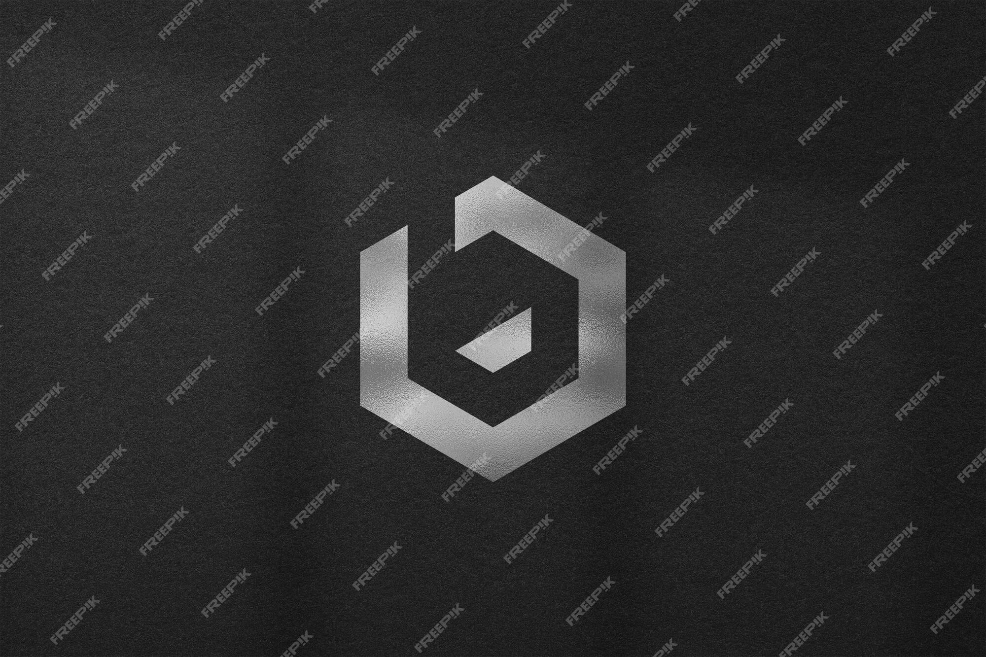 Premium PSD | Silver logo mockup on black textured background with shadow