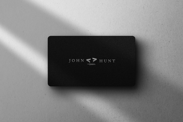 Silver logo mockup on business card