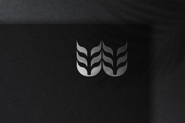 Silver logo mockup on dark paper